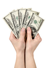 Image showing Hands holds hundreds of dollars