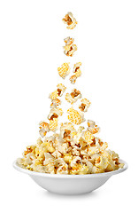 Image showing Popcorn falling in the plate