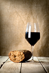 Image showing Wine glass and bread