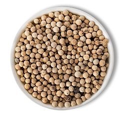 Image showing White pepper in plate isolated