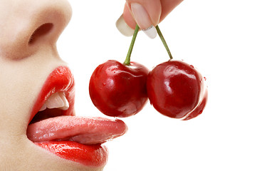 Image showing cherry, lips and tongue