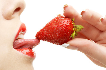 Image showing strawberry, lips and tongue