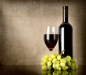 Image showing Dry red wine and grapes 