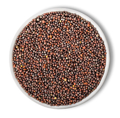 Image showing Black mustard seeds in plate isolated