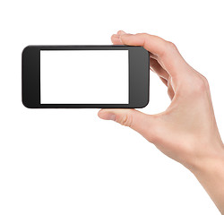 Image showing Black smart phone  in hand