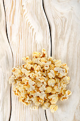 Image showing Heap popcorn on white table