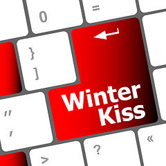 Image showing winter kiss on computer keyboard key button