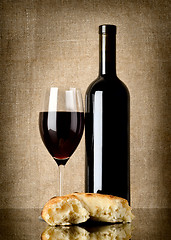 Image showing Wine and  bread on canvas