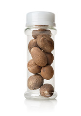 Image showing Nutmegs in a glass jar