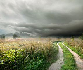 Image showing Storm clouds and road