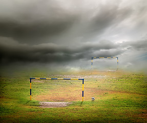 Image showing Clouds over the football field