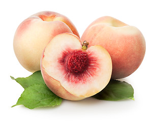 Image showing Three peaches