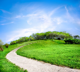 Image showing Road on a green hill