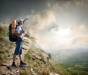 Image showing Tourist on the hillside