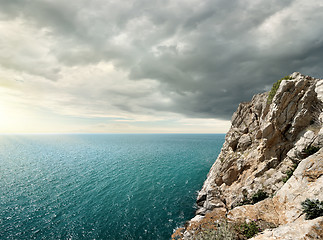 Image showing Gloomy clouds over the sea