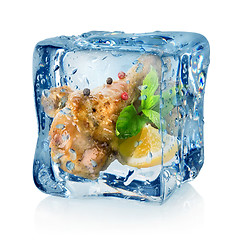 Image showing Fried chicken thighs in ice cube