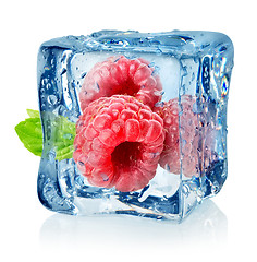 Image showing Ice cube and raspberries isolated