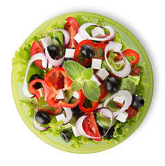 Image showing Salad on a green plate