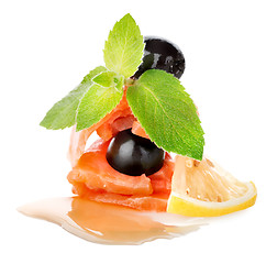 Image showing Salmon with lemons and olives
