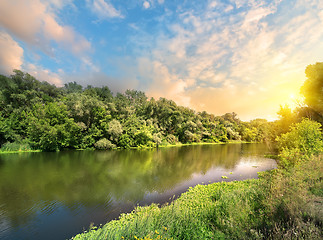 Image showing Sun in the clouds above the river