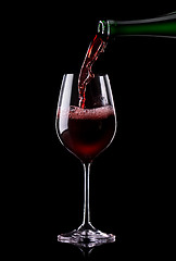 Image showing Wine being poured into a glass