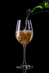 Image showing Pouring champagne