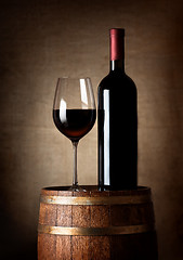 Image showing Wine on a barrel