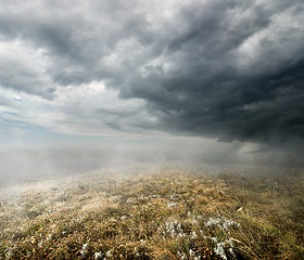 Image showing Clouds over the autumn field