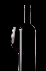 Image showing Glass and bottle of red wine