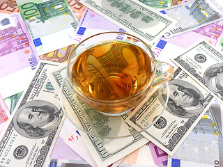 Image showing tea or coffee cup on money wallpaper