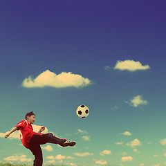 Image showing asian boy playing football - vintage retro style