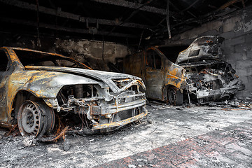 Image showing Close up photo of a burned out cars