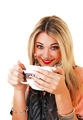 Image showing Girl drinking soup.