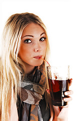 Image showing Girl drinking tee.