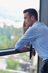 Image showing business man talking by cellphone