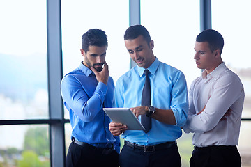 Image showing business man using tablet compuer at office