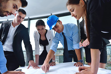 Image showing business people and engineers on meeting