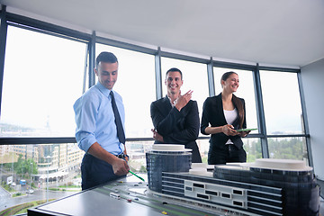 Image showing business people and engineers on meeting