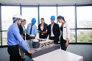 Image showing business people and engineers on meeting