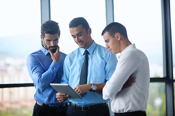 Image showing business man using tablet compuer at office