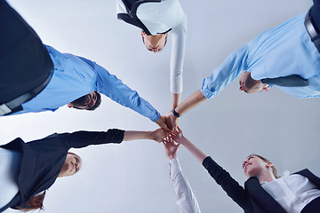 Image showing business people group joining hands