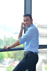 Image showing business man talking by cellphone