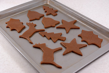 Image showing Festive shaped gingerbread cookies ready for the oven