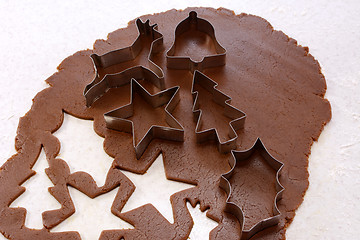 Image showing Cookie cutters and shapes in gingerbread dough