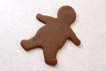 Image showing Gingerbread man shape in cookie dough