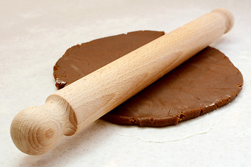 Image showing Rolling out gingerbread cookie dough