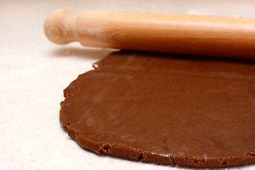 Image showing Gingerbread dough being rolled out