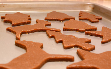 Image showing Closeup of festive gingerbread biscuits ready to baked
