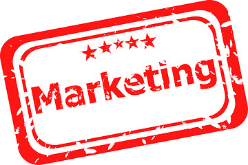 Image showing marketing on red rubber stamp over a white background
