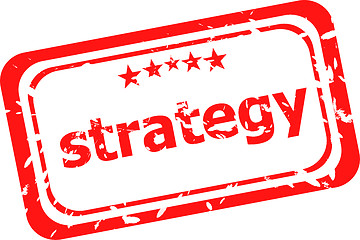 Image showing strategy on red rubber stamp over a white background